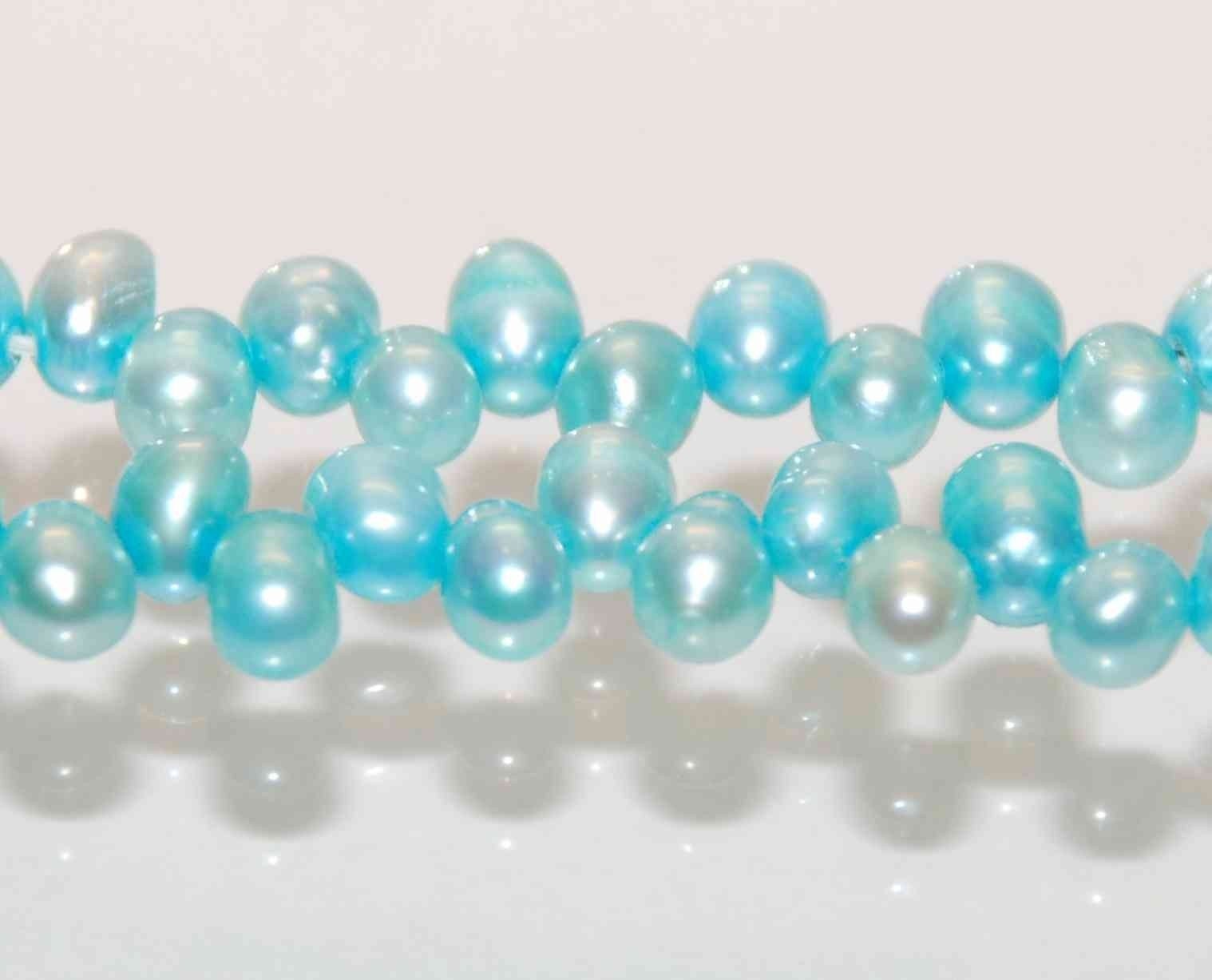 Dancing Pearl Freshwater Pearl aqua blue 5X7mm----full strand 100 pcs -----ON SALE