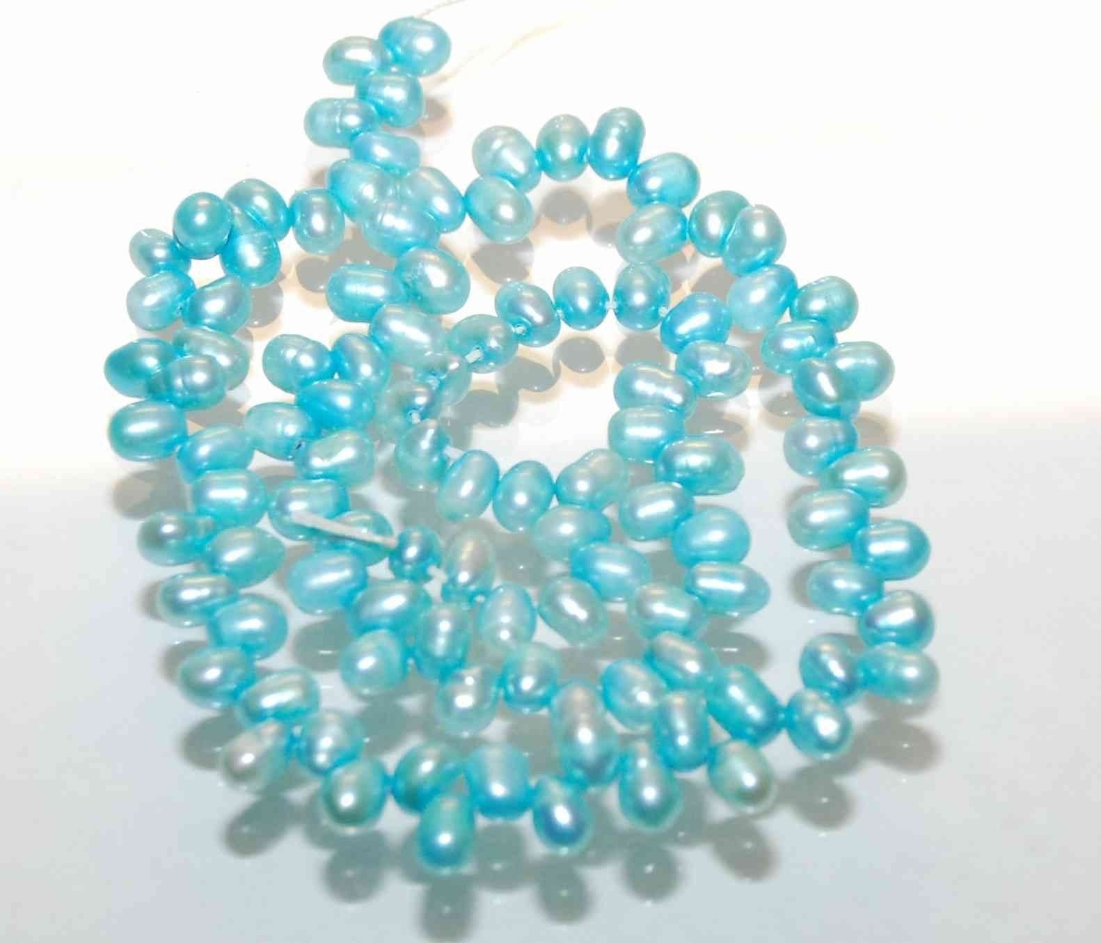 Dancing Pearl Freshwater Pearl aqua blue 5X7mm----full strand 100 pcs -----ON SALE