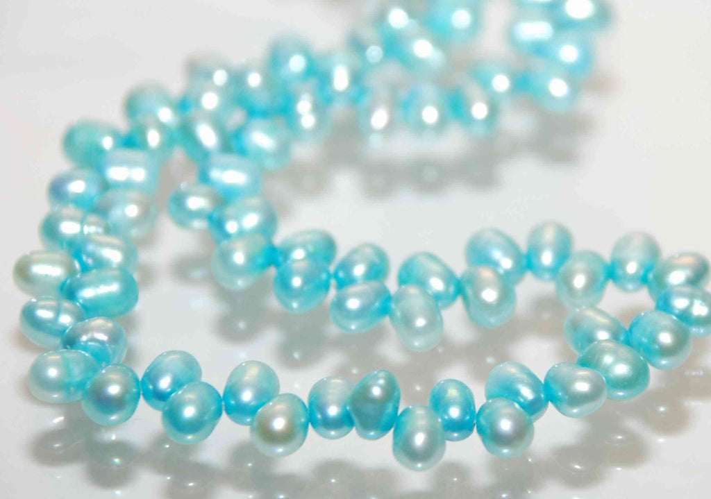 Dancing Pearl Freshwater Pearl aqua blue 5X7mm----full strand 100 pcs -----ON SALE