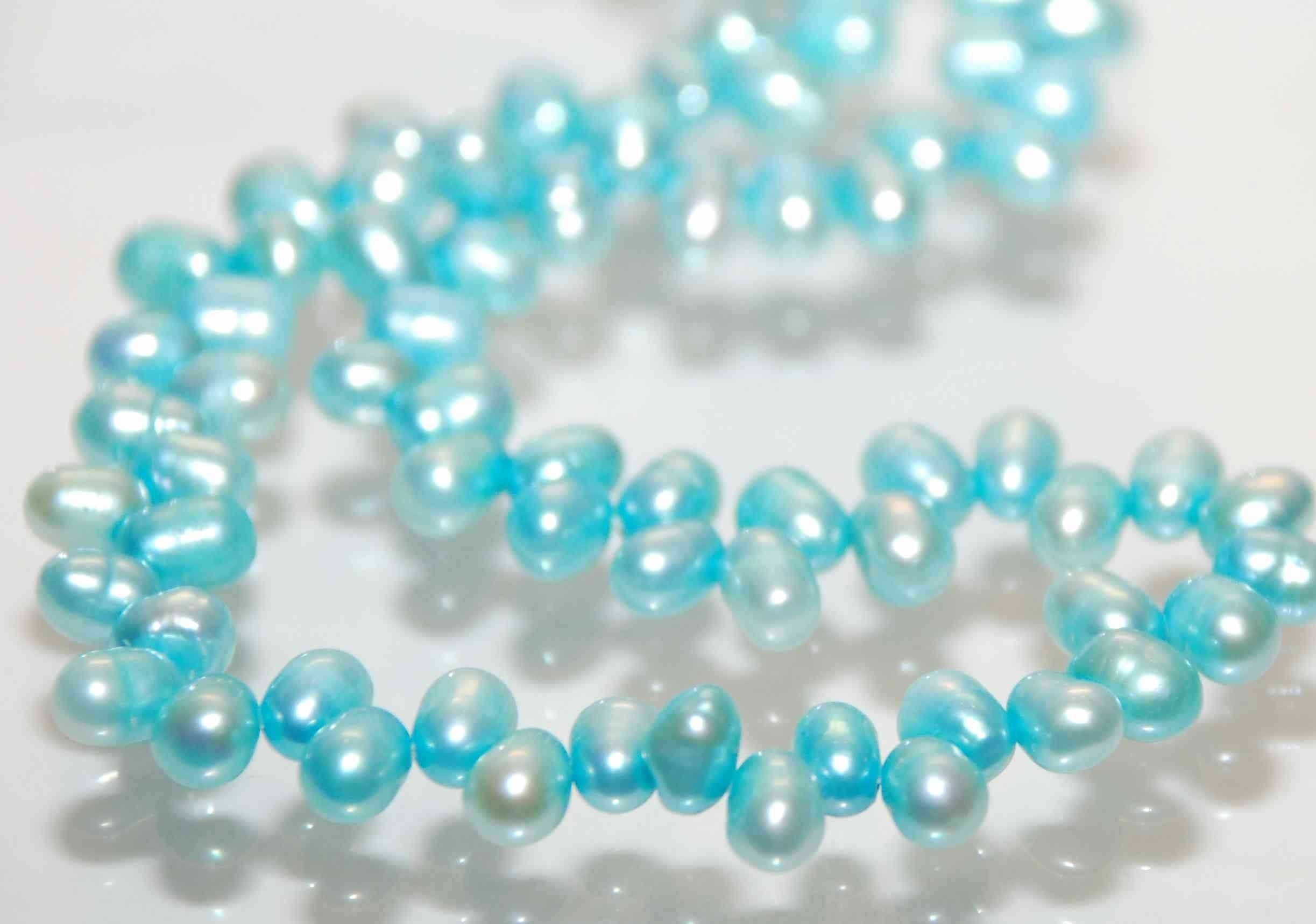 Dancing Pearl Freshwater Pearl aqua blue 5X7mm----full strand 100 pcs -----ON SALE