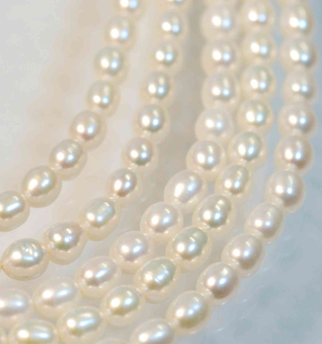 AAA Quality 5.5MMX6-7MM White Ivory Rice oval freshwater Pearls,  15"Full Strand  genuine  pearl, New ARRIVAL for bridle design #DR3003A