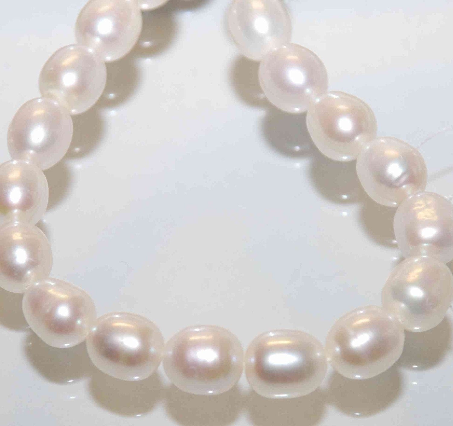 AA 10X12mm LARGE Rice Freshwater Pearl ivory white oval loose pearl beads----HALF strand ---New arrival Sale
