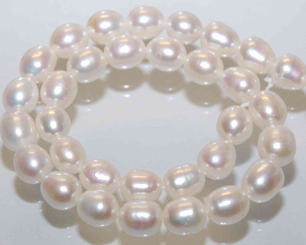 AA 10X12mm LARGE Rice Freshwater Pearl ivory white oval loose pearl beads----HALF strand ---New arrival Sale