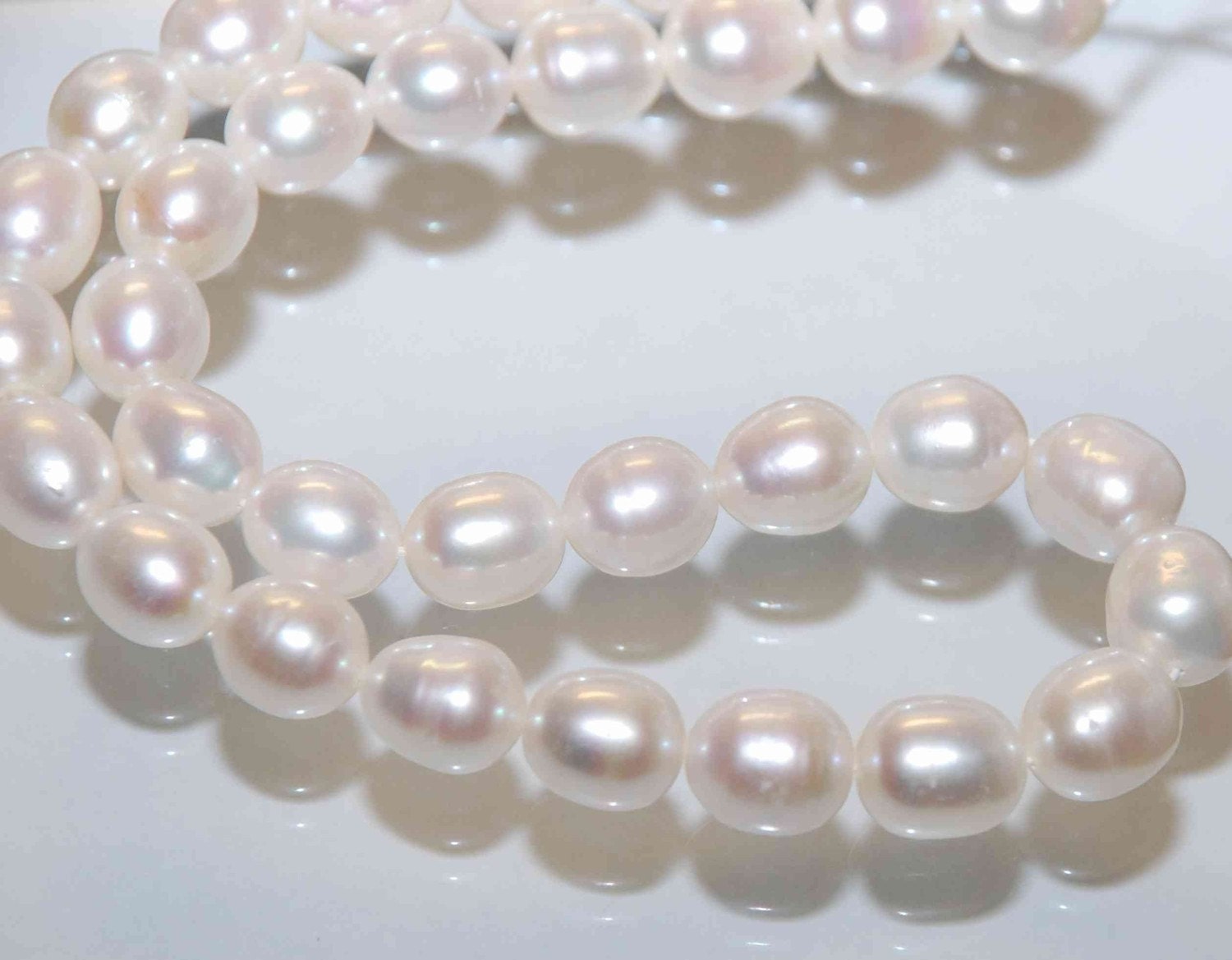 AA 10X12mm LARGE Rice Freshwater Pearl ivory white oval loose pearl beads----HALF strand ---New arrival Sale