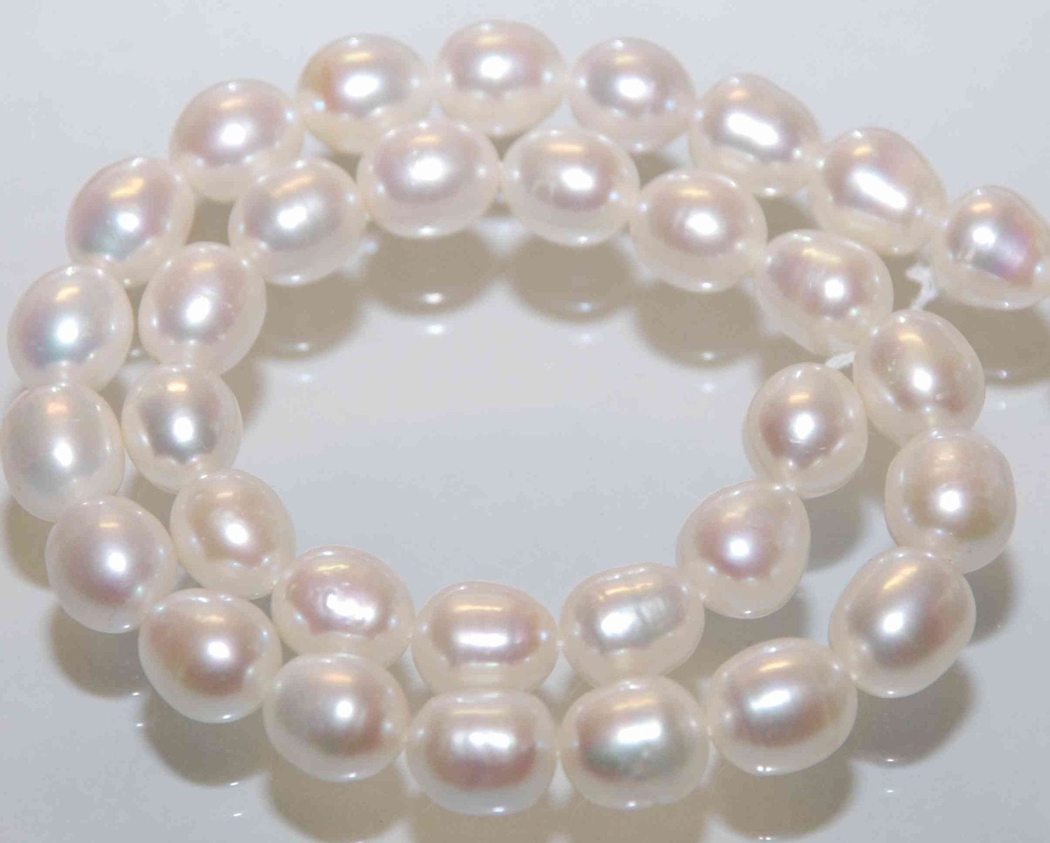 AA 10X12mm LARGE Rice Freshwater Pearl ivory white oval loose pearl beads----HALF strand ---New arrival Sale