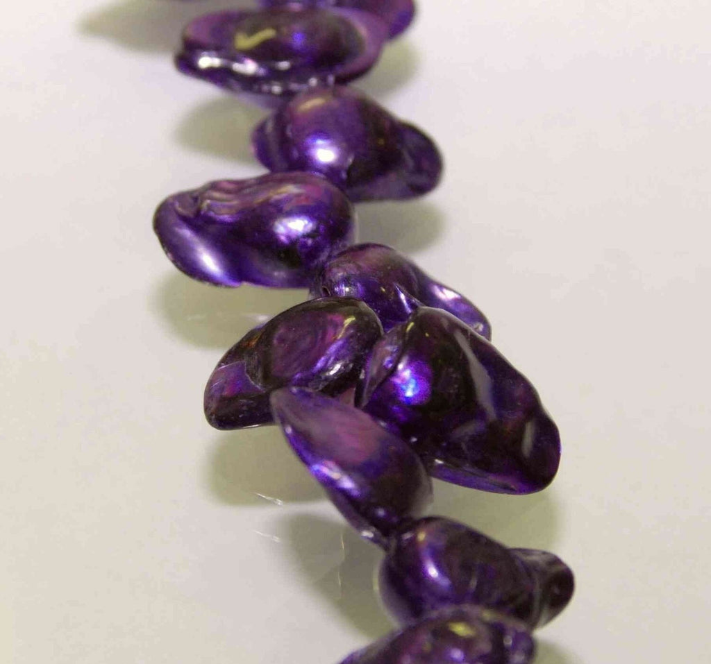 Teeth Biwa Dancing Baroque Pearl Freshwater Pearl Purple color------1 strand -----On Sale