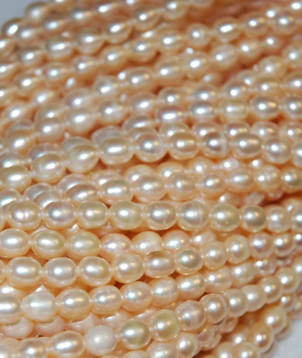 6-7mm AA+ Rice oval Freshwater Pearl Full Strand of Natural Champagne pink color Pearls---15" genuine freshwater pearl----Deal Sale