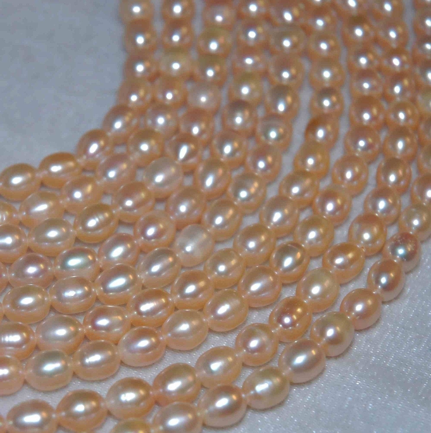 6-7mm AA+ Rice oval Freshwater Pearl Full Strand of Natural Champagne pink color Pearls---15" genuine freshwater pearl----Deal Sale