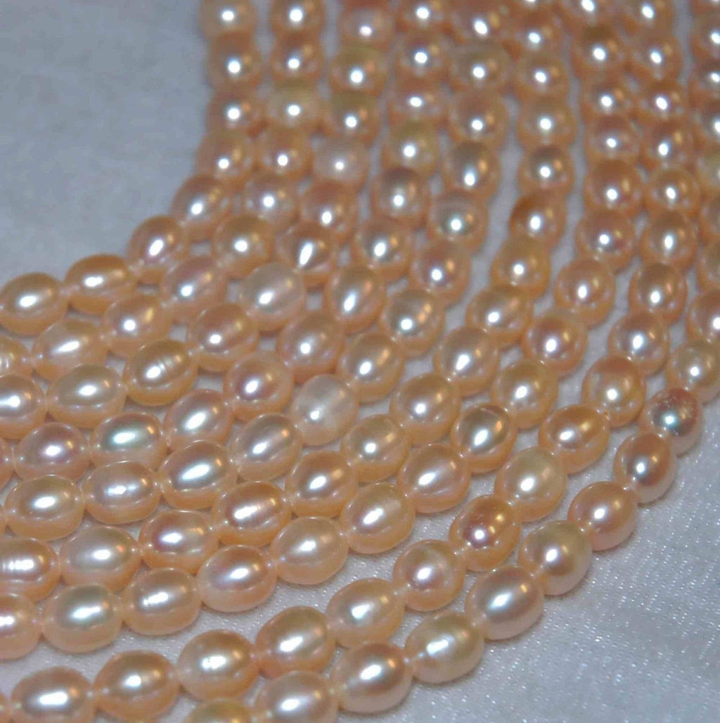 AA+ 6-7mm Rice oval Freshwater Pearl, natural champagne pink pearl beads---15''  full strands 55pc loose pearl beads----Deal Sale