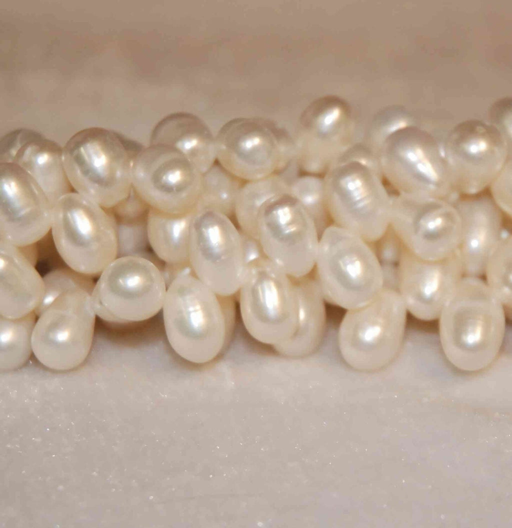 11mmX8mm Big briolette freshwater  Pearls---- 1 full strand  Ivory White dancing pearl