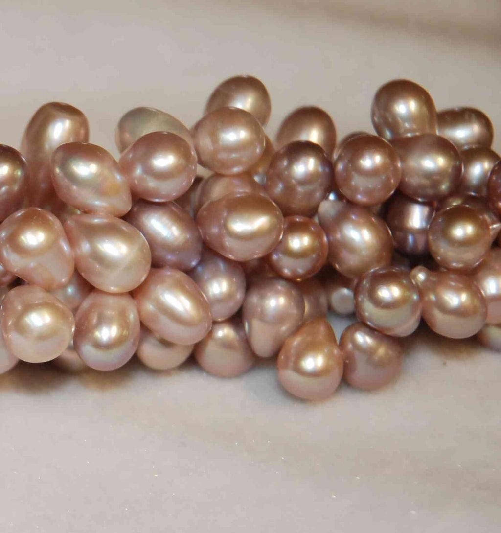 11mmX8mm Big Dancing Pearls----1 full strand about piececs Natural Purple dancing pearl 15inches