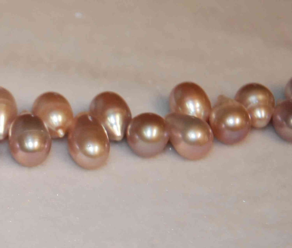 11mmX8mm Big Dancing Pearls----1 full strand about piececs Natural Purple dancing pearl 15inches