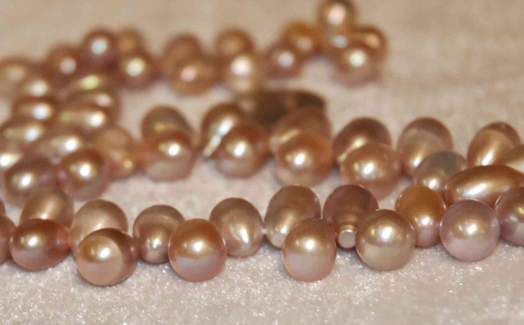 11mmX8mm Big Dancing Pearls----1 full strand about piececs Natural Purple dancing pearl 15inches
