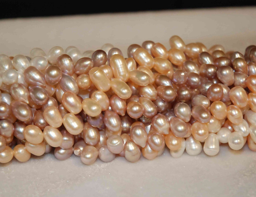 11mmX8mm Big Dancing Pearls----1 full strand about piececs Natural Purple dancing pearl 15inches