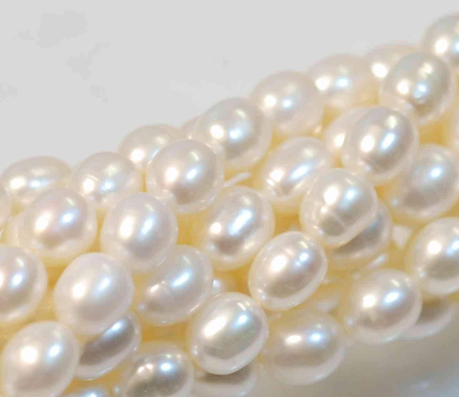 AA- AAA High quality full Strand of 6-7MMX 8mm stunning luster White Ivory Rice oval freshwater Pearl 15"  genuine pearl beads---Deal SALE