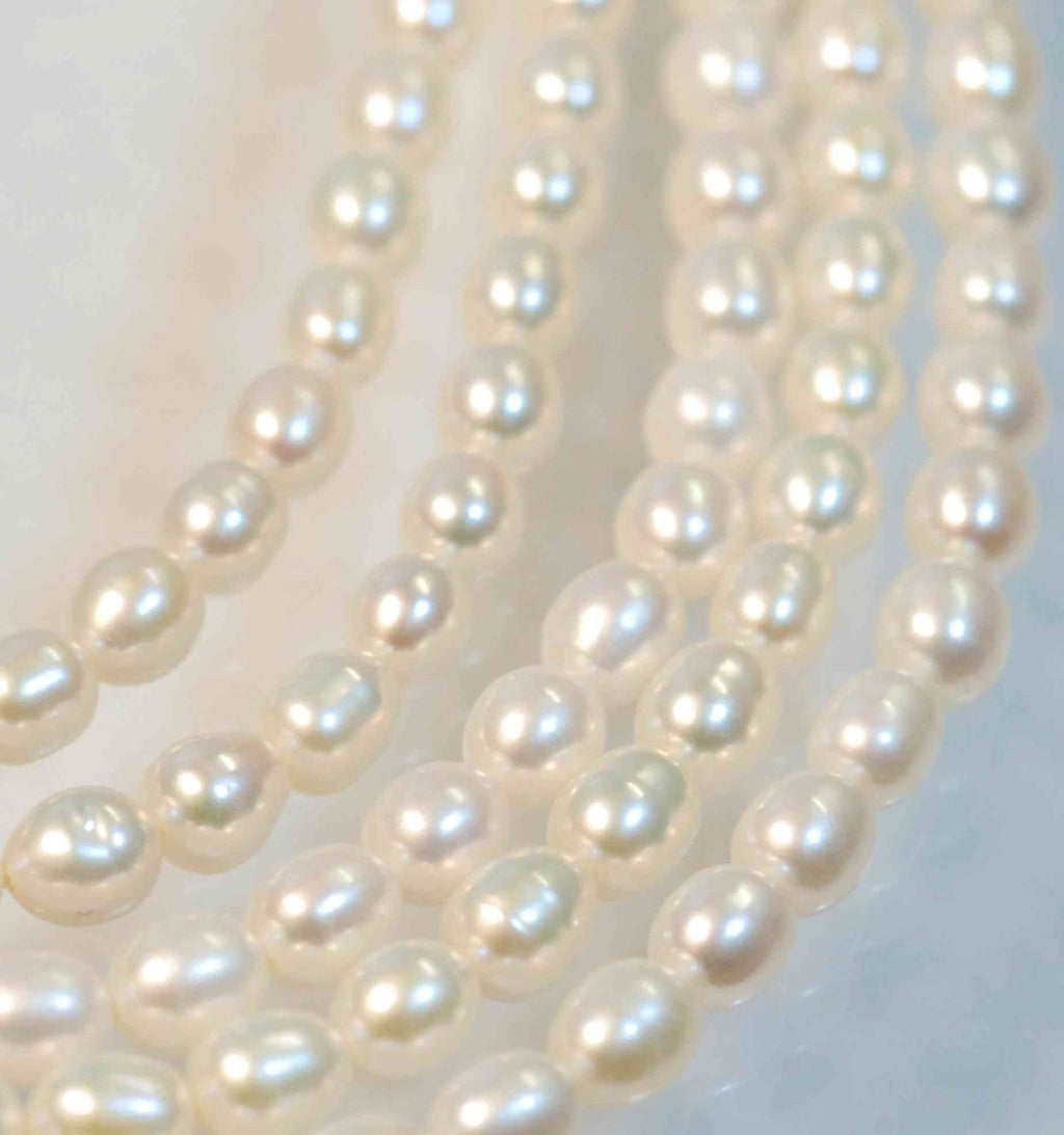 AA- AAA High quality full Strand of 6-7MMX 8mm stunning luster White Ivory Rice oval freshwater Pearl 15"  genuine pearl beads---Deal SALE