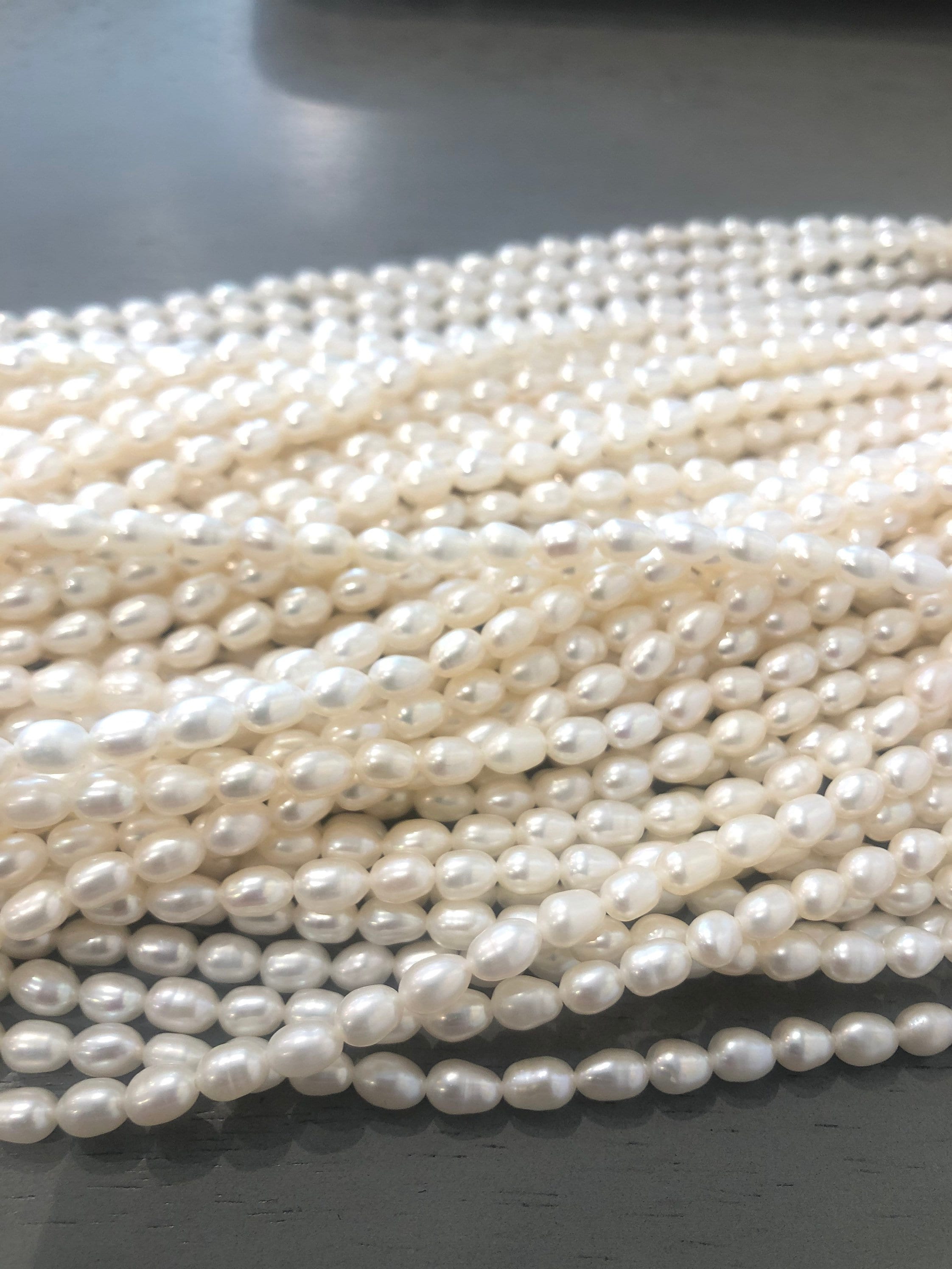 AAA Ivory white 4.5mmX6mm Oval Rice Freshwater Pearl Full strand 15" 60 pieces rice seeds genuine pearl beads for designer DIY--New Arrival