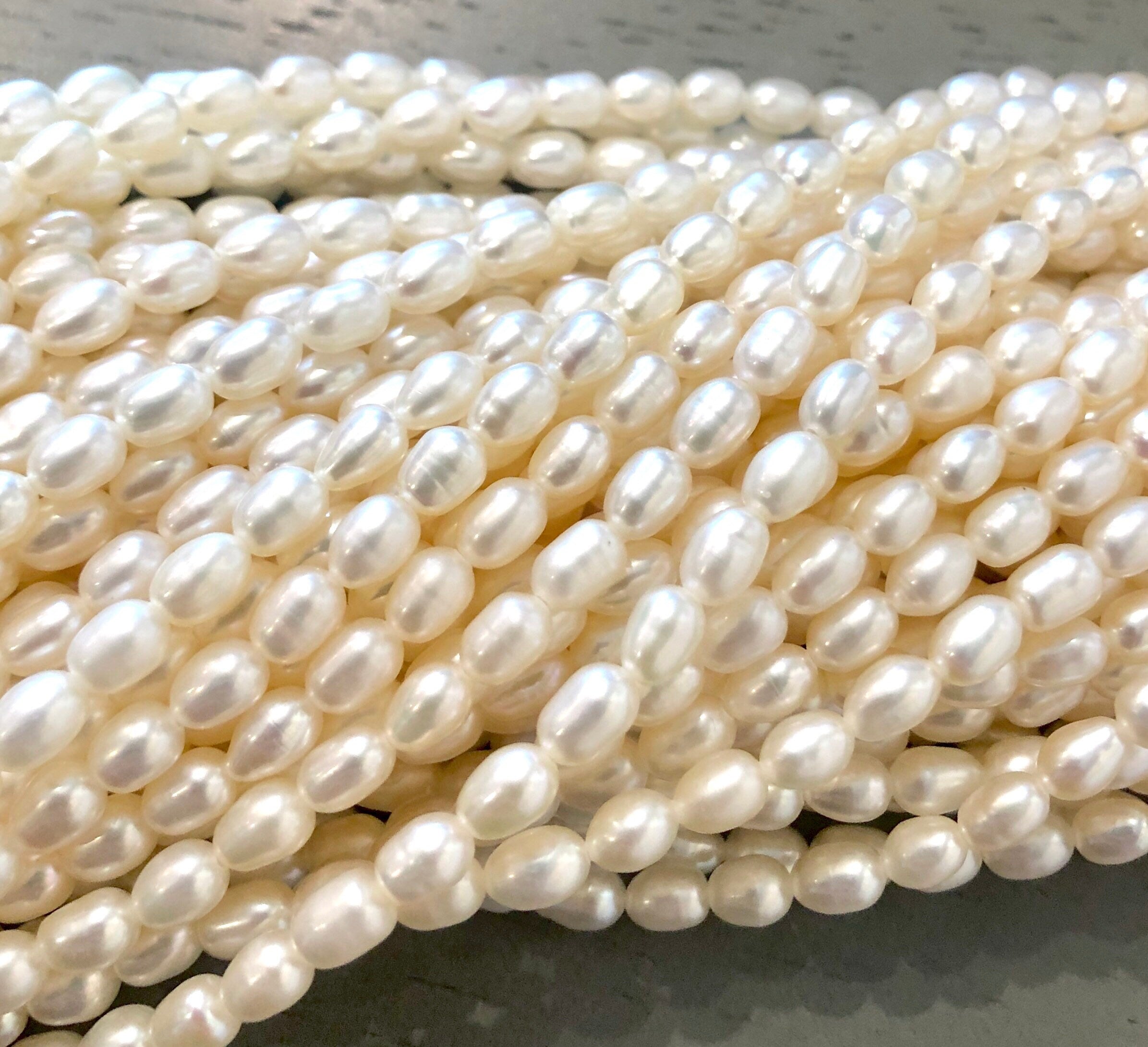 AAA Ivory white 4.5mmX6mm Oval Rice Freshwater Pearl Full strand 15" 60 pieces rice seeds genuine pearl beads for designer DIY--New Arrival