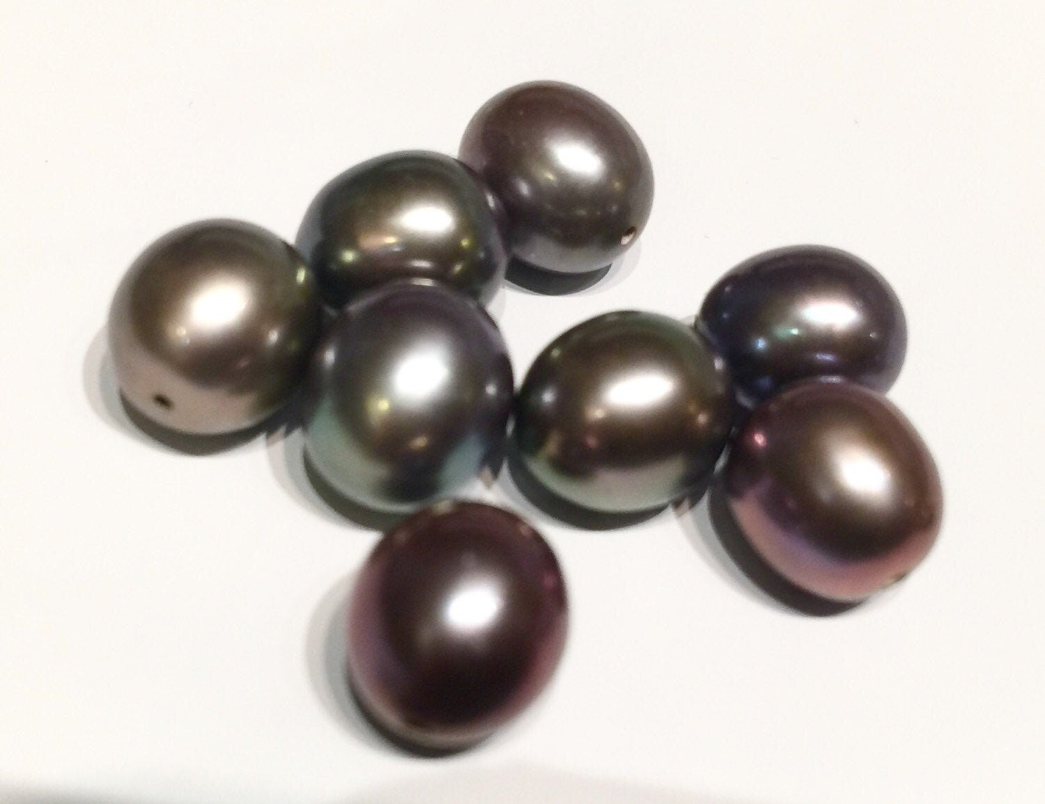 8.5X9.5mm half drilled, AAA+ top Gem quality perfect tear drop pair, Peacock black Tahiti color genuine pearl, Matched pair pearl, New