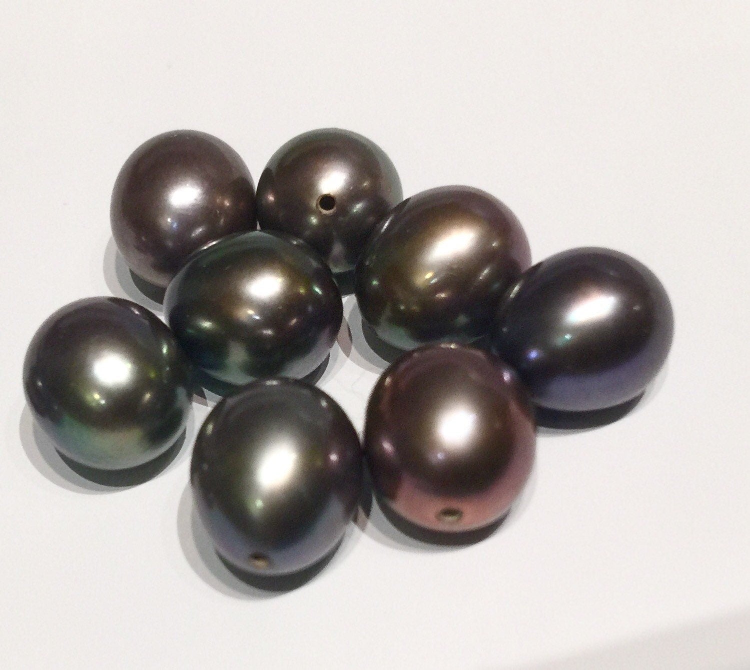 8.5X9.5mm half drilled, AAA+ top Gem quality perfect tear drop pair, Peacock black Tahiti color genuine pearl, Matched pair pearl, New
