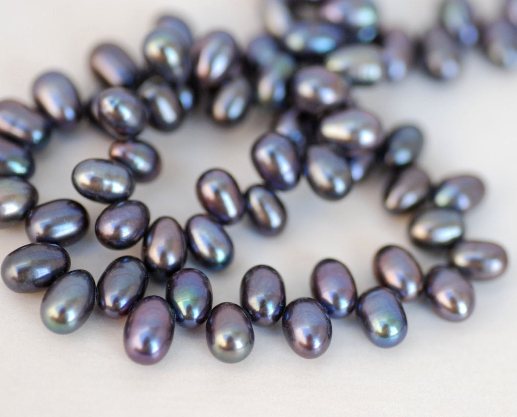 5.5mm X 8mm Full strand AAA Gem quality dancing Freshwater Pearl----85  pieces peacock blue rice pearls top drilled  #DR3137