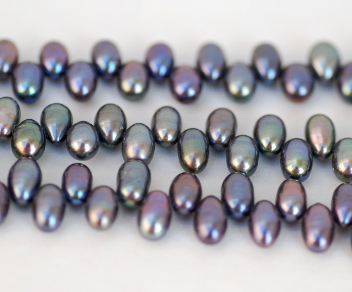 Batche SALE 3  Full strands  Top Drilled AAA Gem quality 5.5mm X 8mm dancing Freshwater Pearl 85 pc peacock blue rice pearls