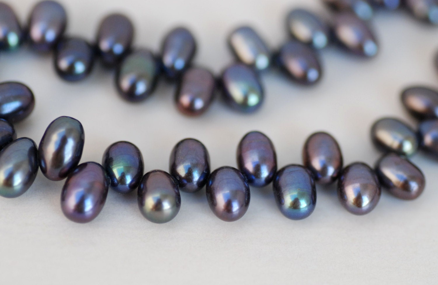 Batche SALE 3  Full strands  Top Drilled AAA Gem quality 5.5mm X 8mm dancing Freshwater Pearl 85 pc peacock blue rice pearls