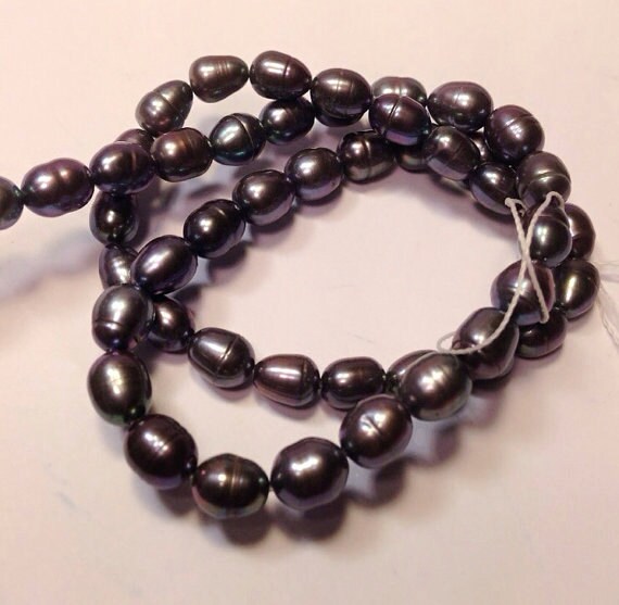 AA+ 6-7mm X 7-9mm Rice Pearl Oval Pearl Freshwater Pearl peacock blue pearl---- 15" full strand 45pc #DR3013