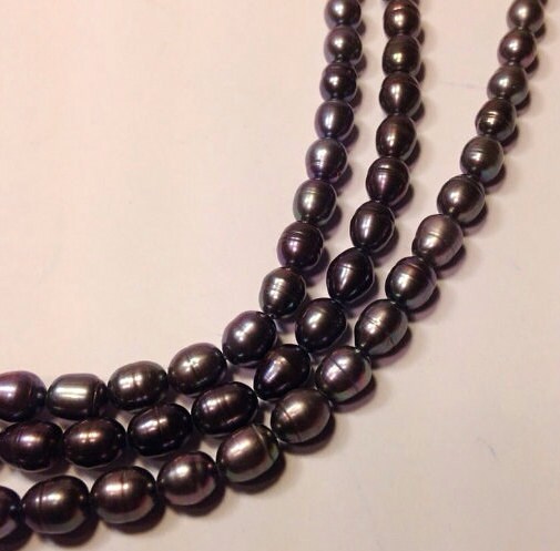 AA+ 6-7mm X 7-9mm Rice Pearl Oval Pearl Freshwater Pearl peacock blue pearl---- 15" full strand 45pc #DR3013
