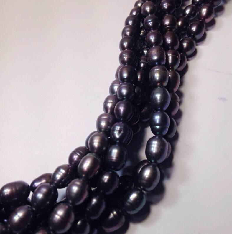 AA+ 6-7mm X 7-9mm Rice Pearl Oval Pearl Freshwater Pearl peacock blue pearl---- 15" full strand 45pc #DR3013
