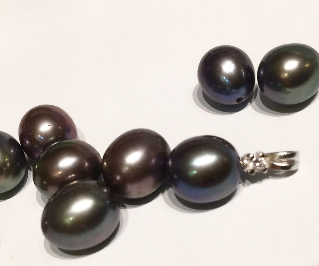 8.5X9.5mm half drilled, AAA+ top Gem quality perfect tear drop pair, Peacock black Tahiti color genuine pearl, Matched pair pearl, New