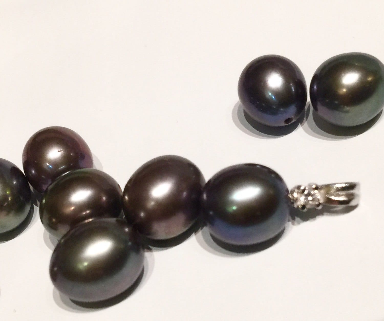 8.5X9.5mm half drilled, AAA+ top Gem quality perfect tear drop pair, Peacock black Tahiti color genuine pearl, Matched pair pearl, New