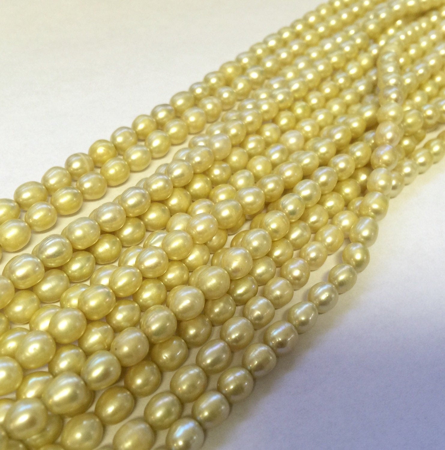 AA quality 5mm X 6mm Rice Oval Freshwater Pearl Fresh yellow Lemon pearl for design 15" full strand 65pc #DR3210