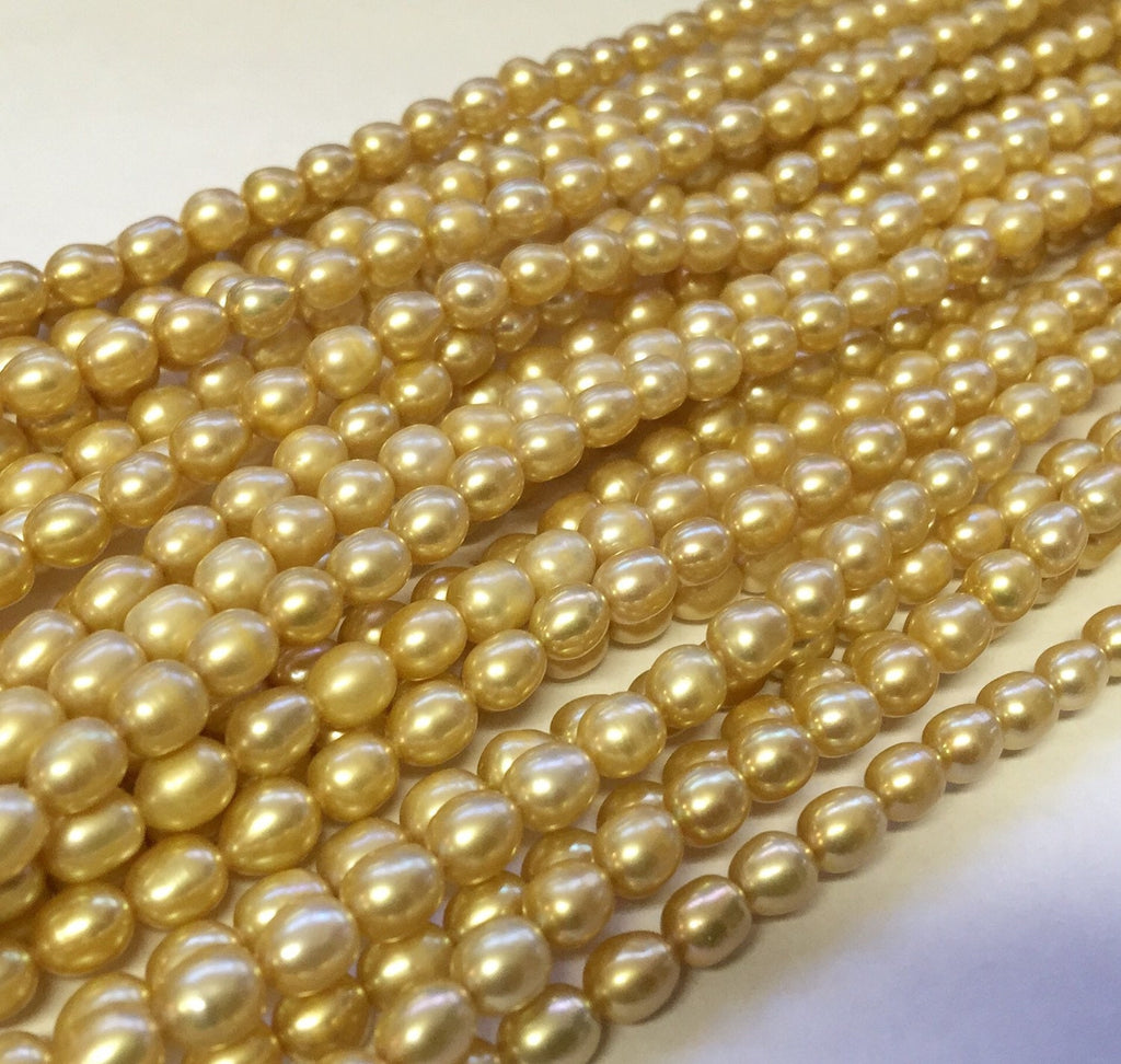 AA 5mm X 6mm Rice Pearl, Oval Pearl, Freshwater Pearl,  yellow champagne pearl 15 inches full strand 65pc #DR32