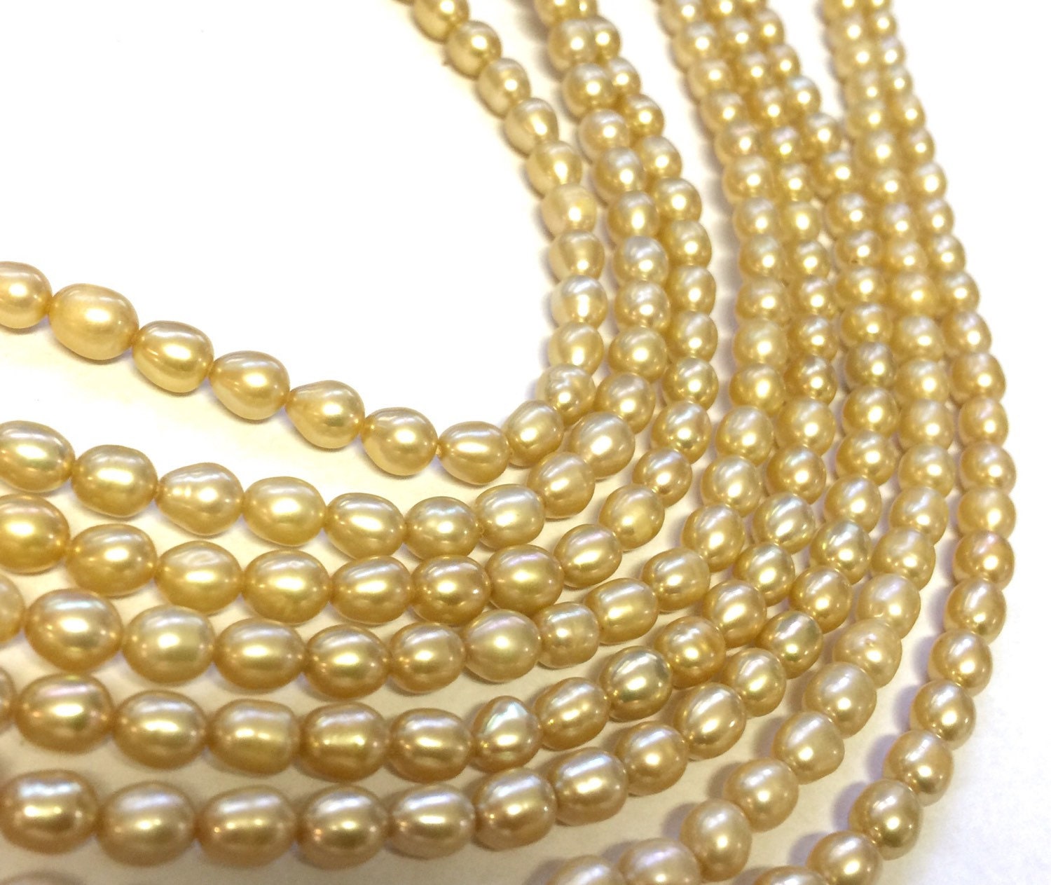 AA 5mm X 6mm Rice Pearl, Oval Pearl, Freshwater Pearl,  yellow champagne pearl 15 inches full strand 65pc #DR32