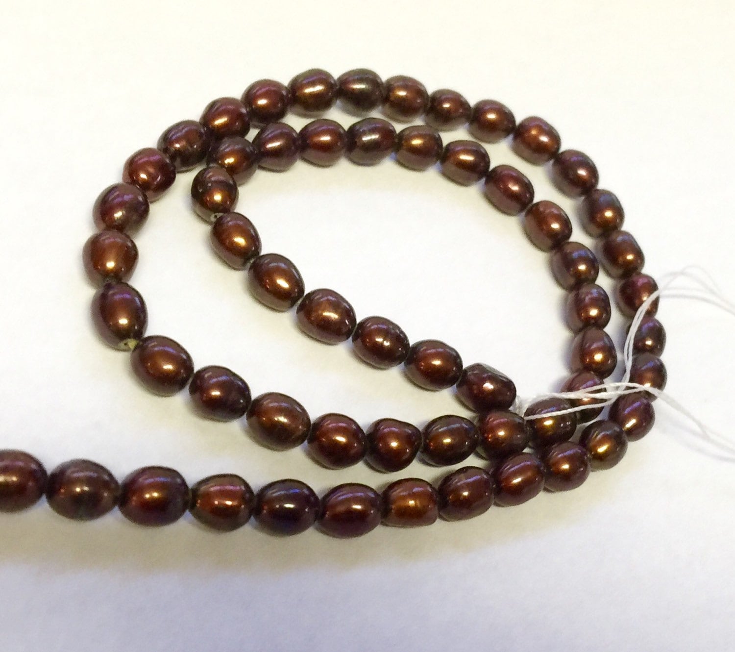 AA+ 5-6mm X 6-7mm Dark Rice Pearl, Oval Pearl, Freshwater Pearl, deep brown pearl 15 inches full strand 65pc loose pearl beads #DR3209